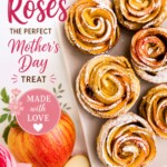 Apple roses on a white rectangle plate, then sprinkled with powdered sugar.