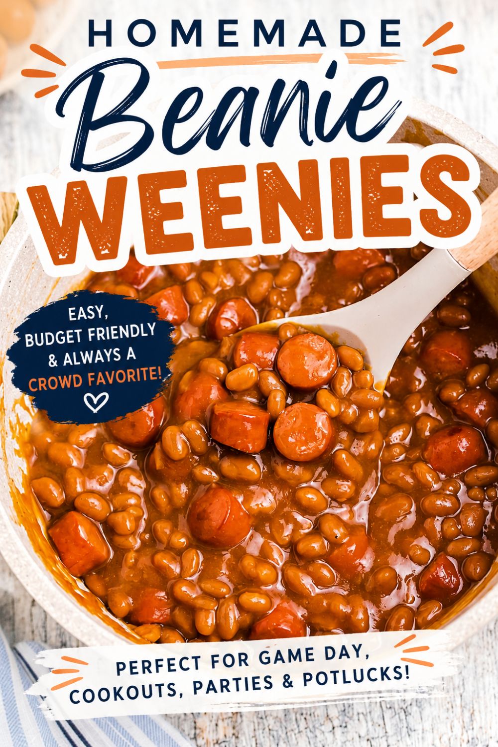 Pinterest pin for Homemade Beanie Weenies featuring a bowl of baked beans and sliced hot dogs with text overlay reading “Homemade Beanie Weenies” and “Perfect for Game Day, Cookouts, Parties and Potlucks.”