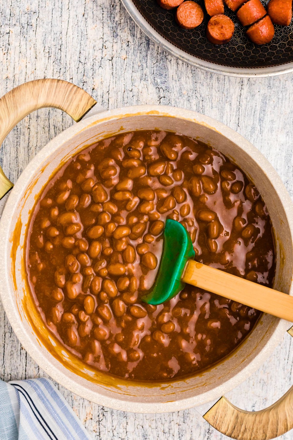 Beans and other ingredients in saucepan after simmering.