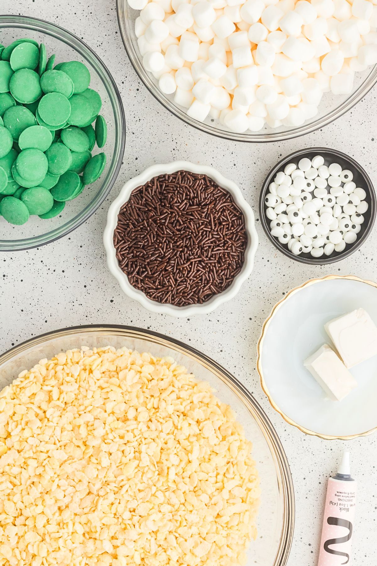 Rice cereal with other ingredients needed to make rice krispies treats. 