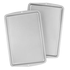 Two gray Wilton baking sheets