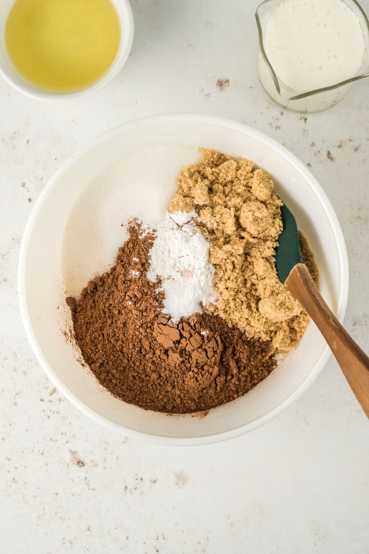 Dry ingredients being mixed in a large bowl. 