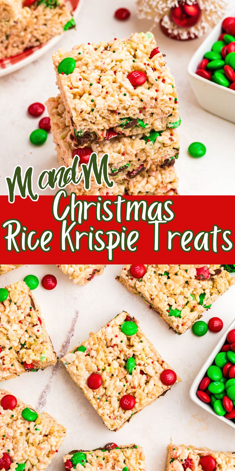 Rice krispie treats with red and green m and m's mixed in, cut into squares, laid out on a marble table and stacked on the table.