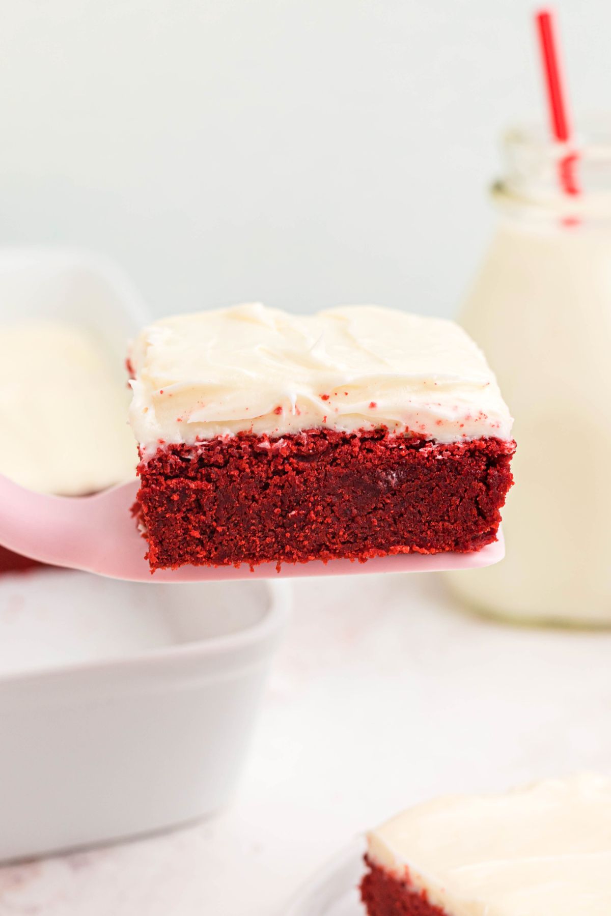 Red velvet bar on a pink spatula 