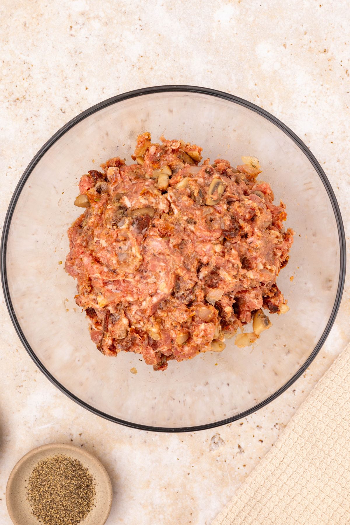 Uncooked meat combined with breadcrumbs and other seasonings, before shaping into a meatloaf. 