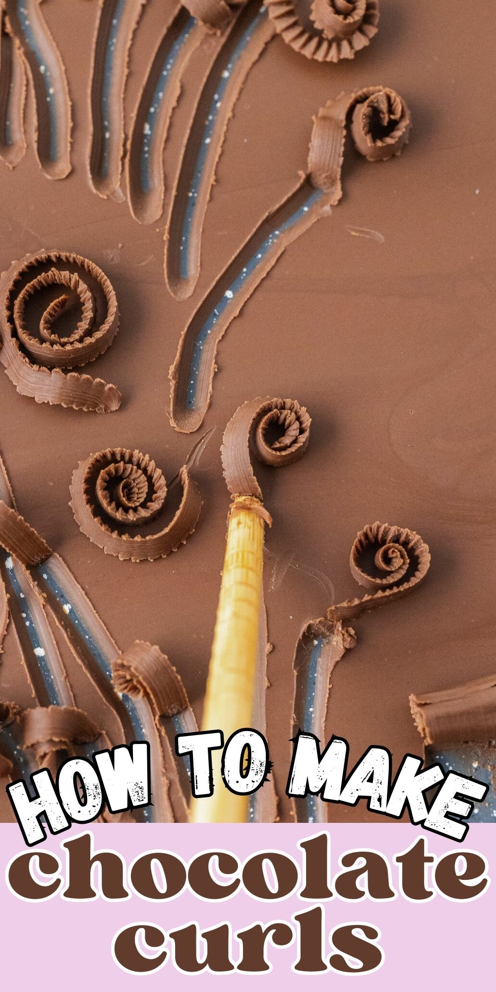 Chocolate spread onto a baking sheet, making chocolate curls.