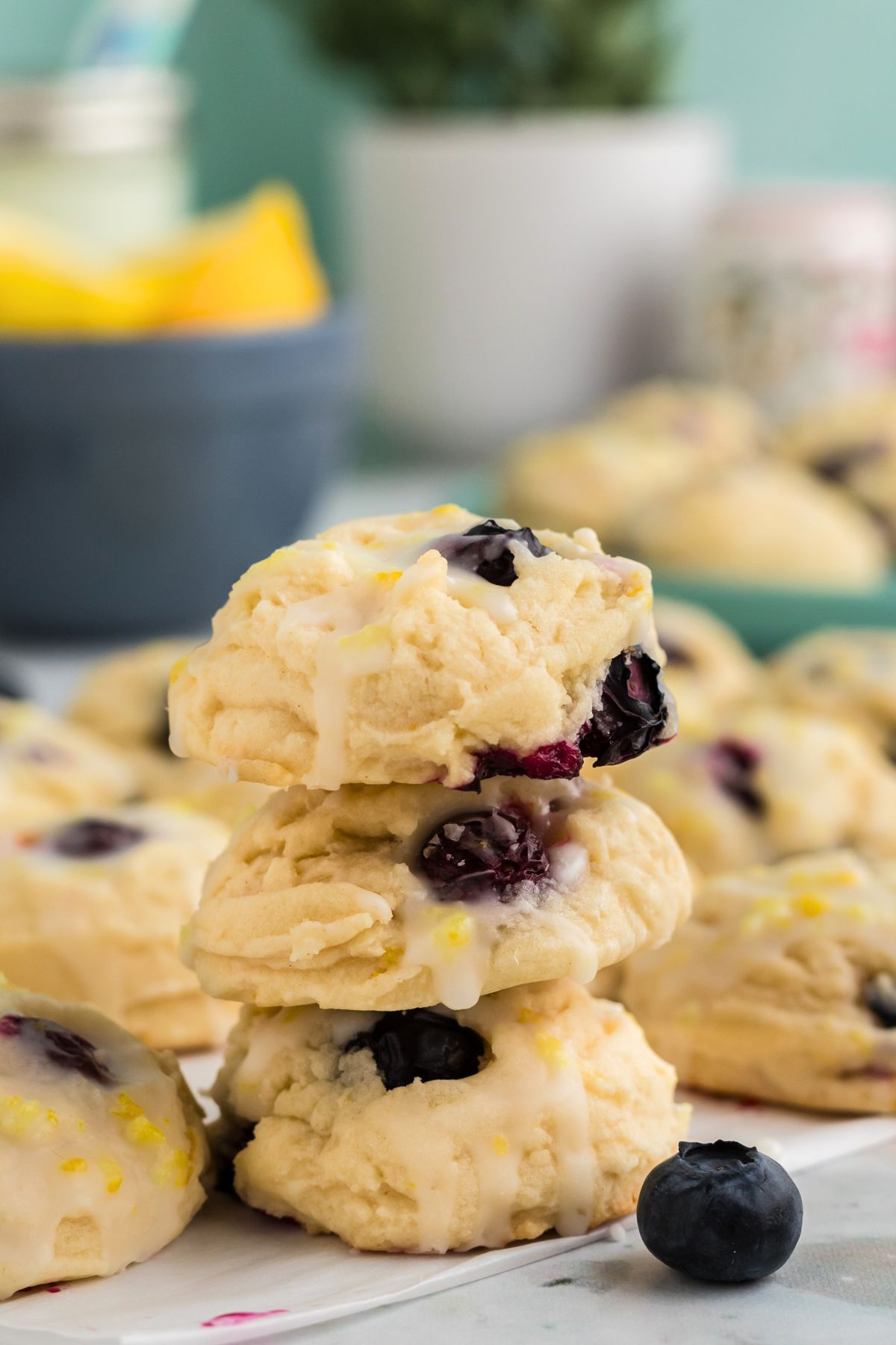 Lemon blueberry cookies  stacked on a marble table. 