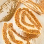 Golden, moist carrot cake rolled and filled with frosting.