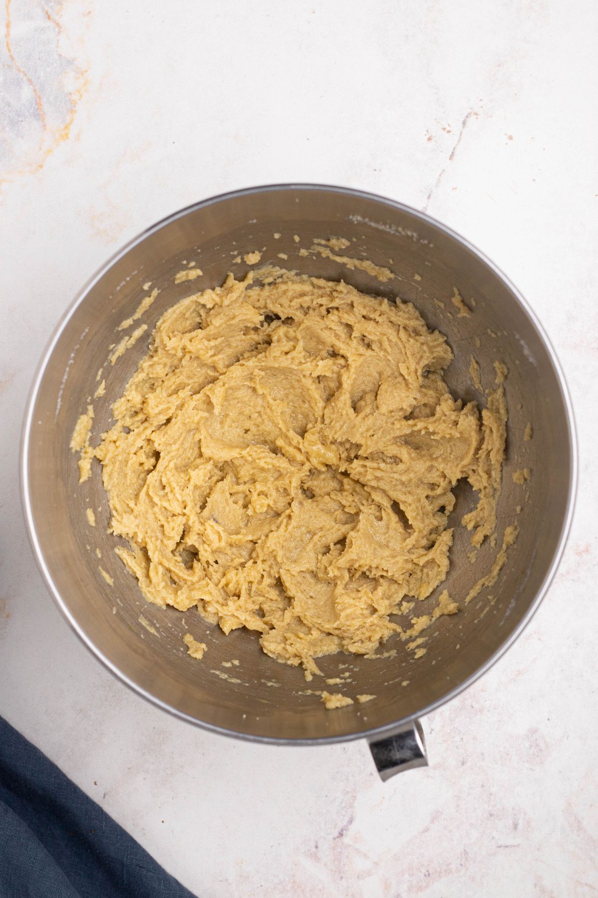 Cookie dough in a mixing bowl before adding cocoa powder and chocolate chips. 