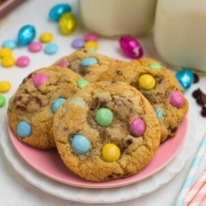 Golden baked chocolate chip cookies with Easter m and m;s.