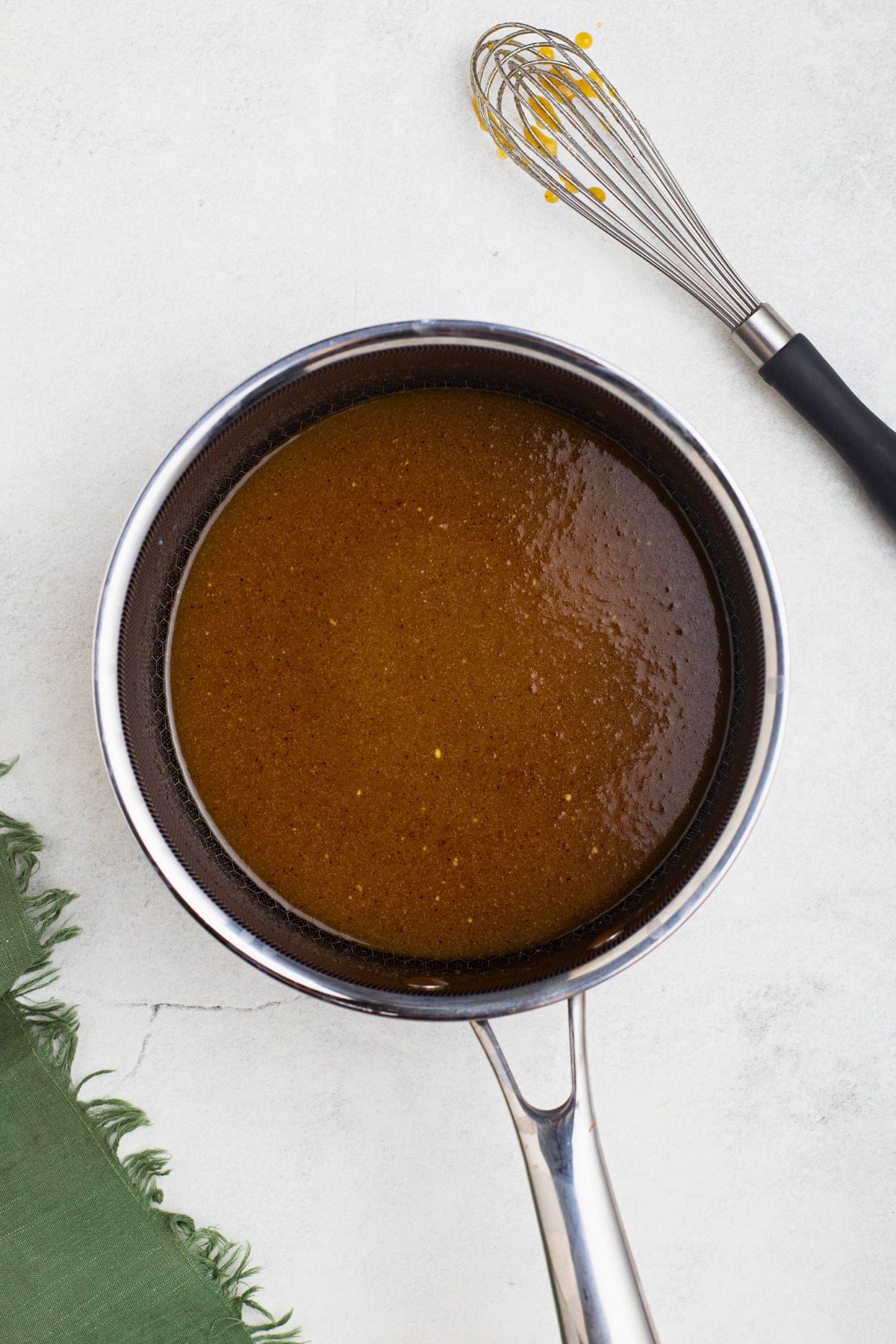 Ham glaze being made in saucepan. 