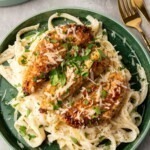 Golden seasoned chicken on top of fettuccini tossed with alfredo sauce.