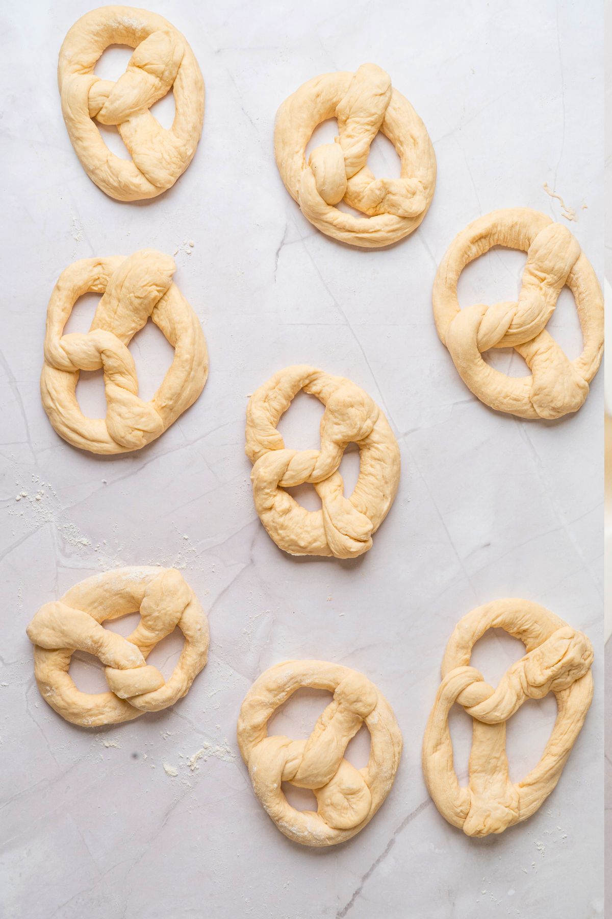 Pretzel dough rolled and then shaped into pretzel twists. 