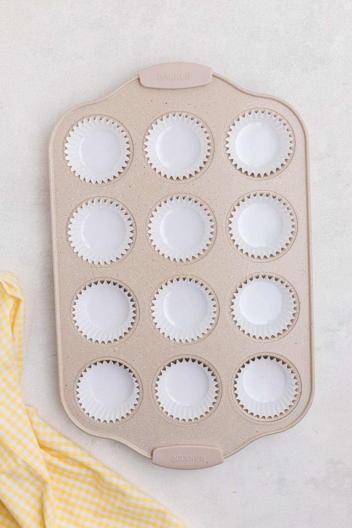 Muffin tin lined with paper liners.
