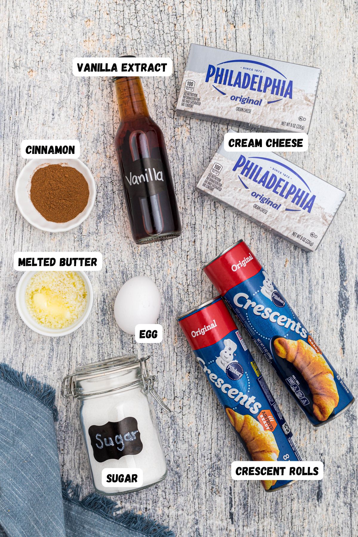 Ingredients measured into small bowls on a wooden tabletop. 