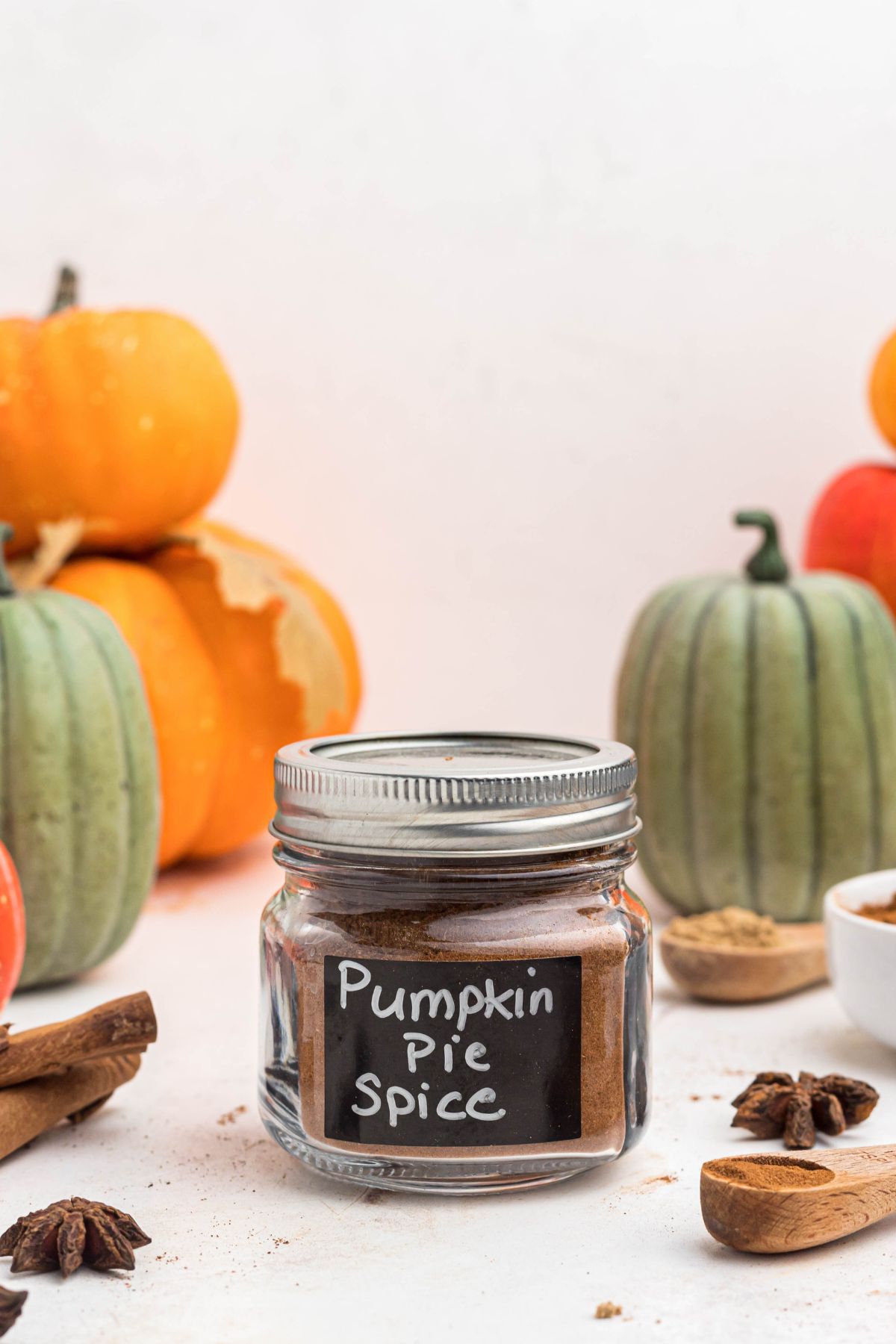 Spices mixed together and poured into a small jar, then labeled, "pumpkin pie spice."