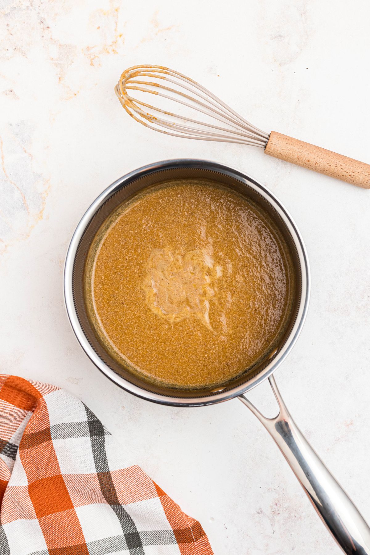 Pumpkin and spice mixture lightly simmered together in a small saucepan. 