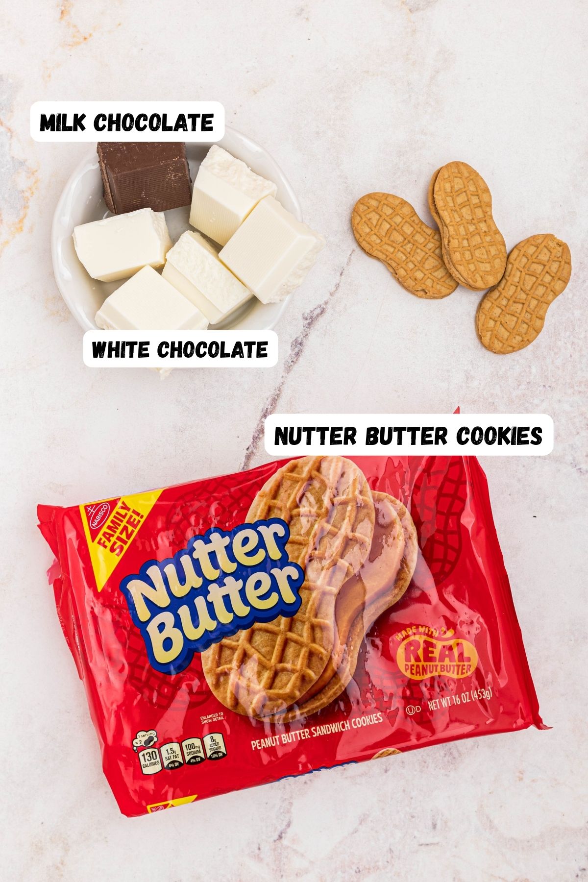 Package of cookies with small bowl of chocolate and white chocolate melting chocolate in white bowls on a marble table. 