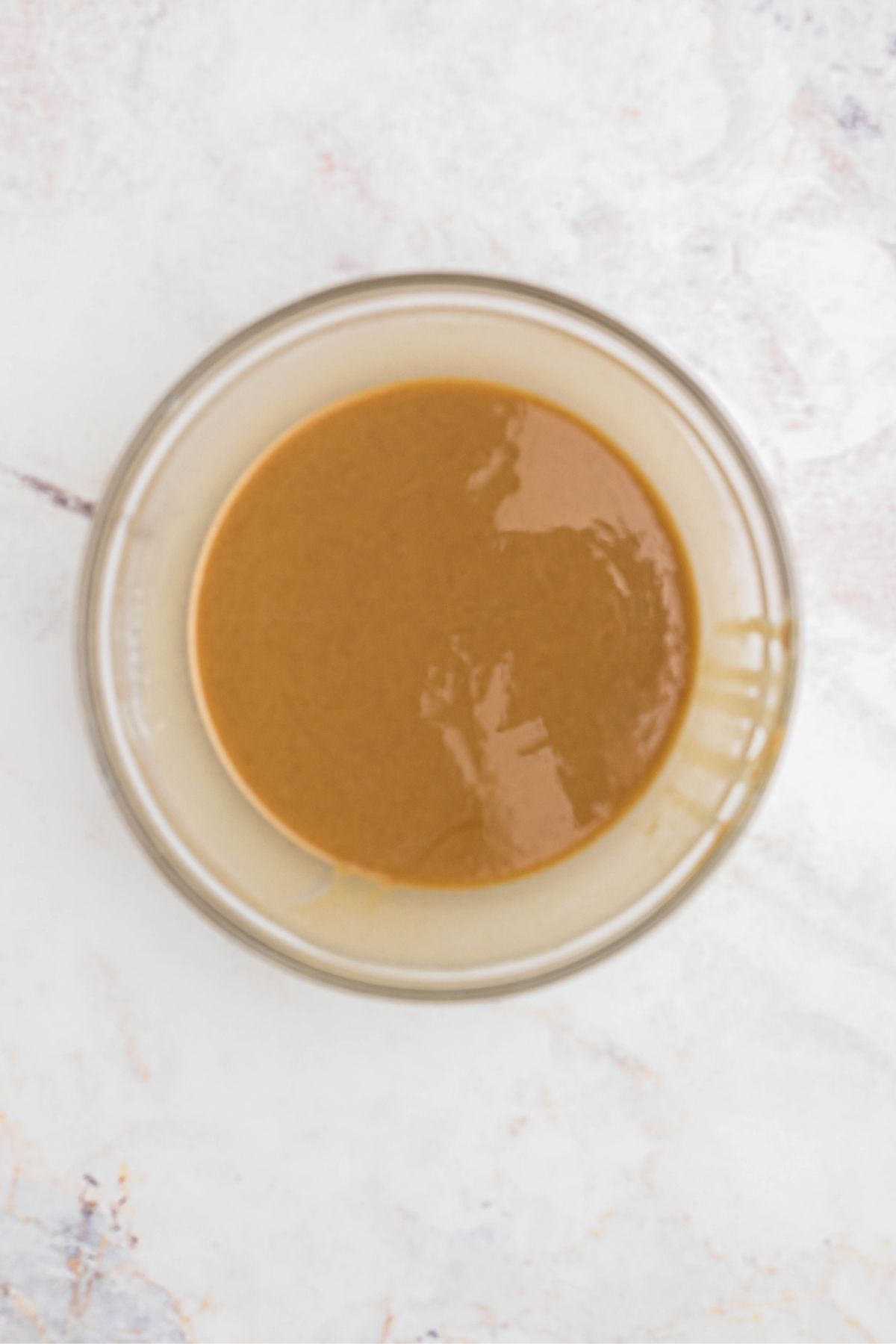 Melted peanut butter and butter, mixed with vanilla and salt. 