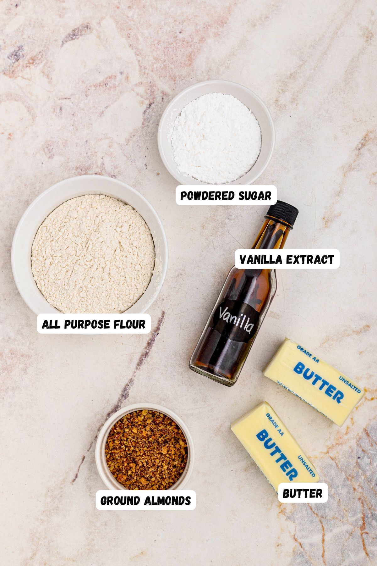 Ingredients measured onto marble counter and labeled.