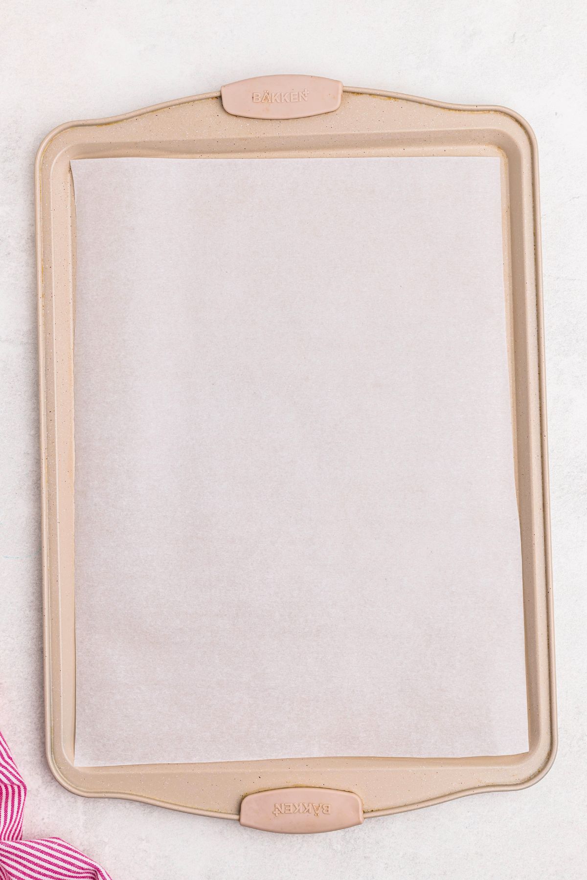 baking pan lined with parchment paper.