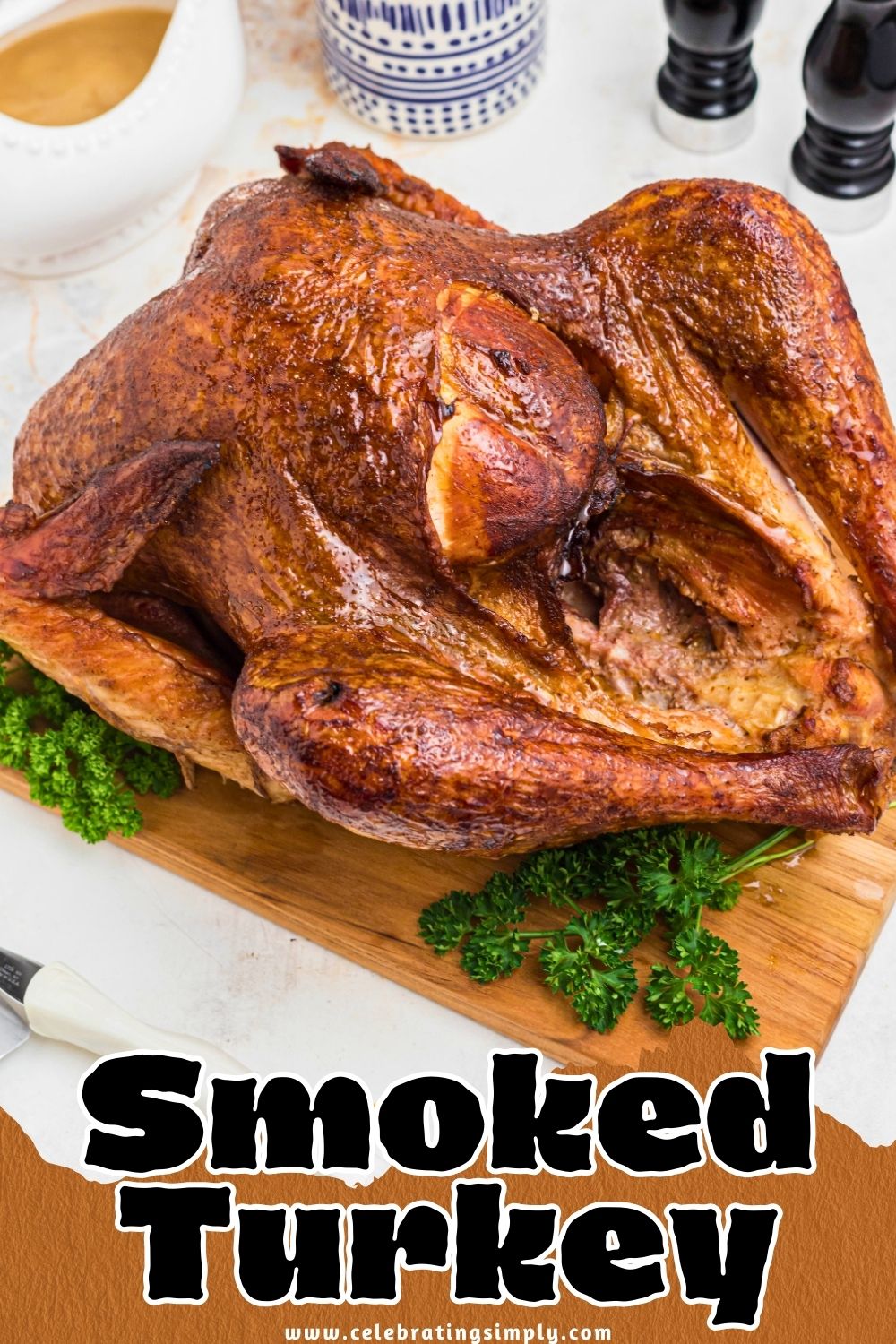 Golden smoked turkey on a brown wooden cutting board, with parsley next to it as a garnish.