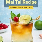 Rum and other ingredients, mixed together to make a Mai Tai, in a clear half glass, topped with a cherry and lime slice as a garnish.