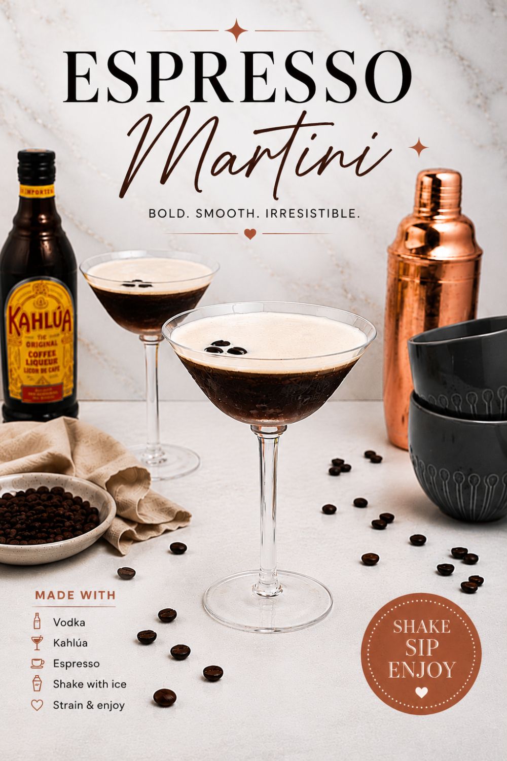 Martini glass with coffee and vodka mixture, with a frothy foam on top, on a marble table with coffee beans scattered.