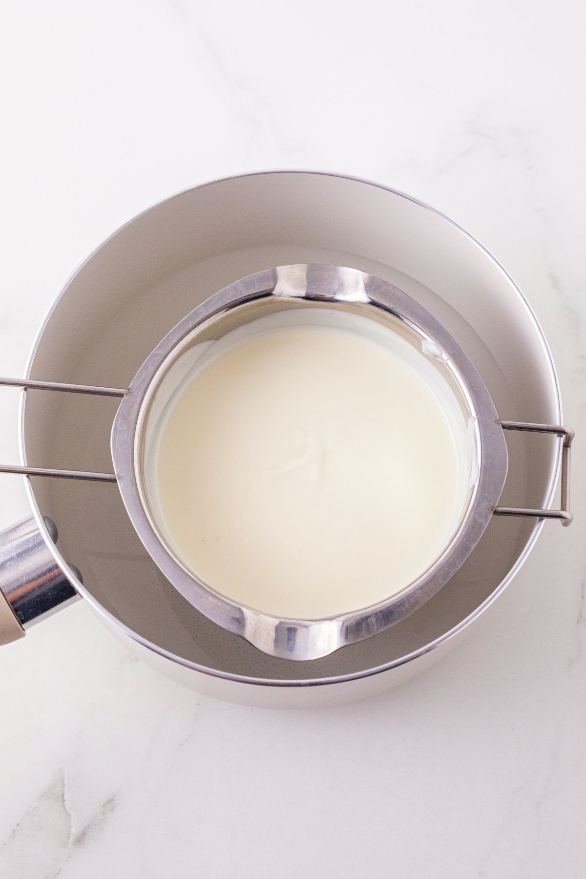 White chocolate melts, melted in a pan, and stirred until smooth and creamy. 
