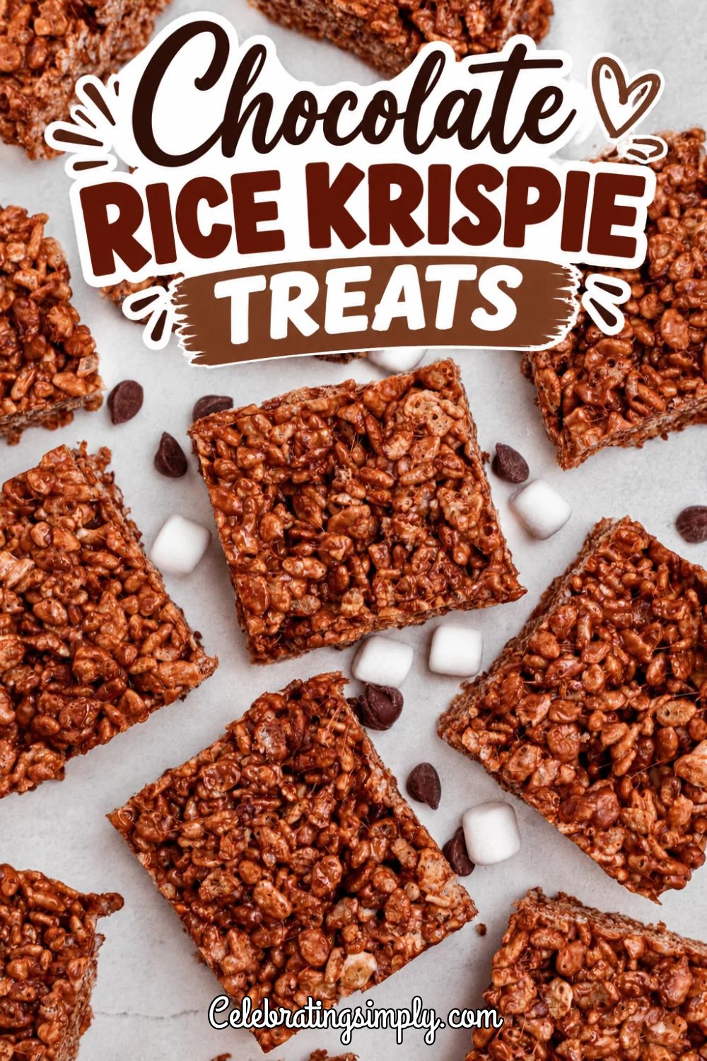 Chocolate treats cut into squares on a white marble table.